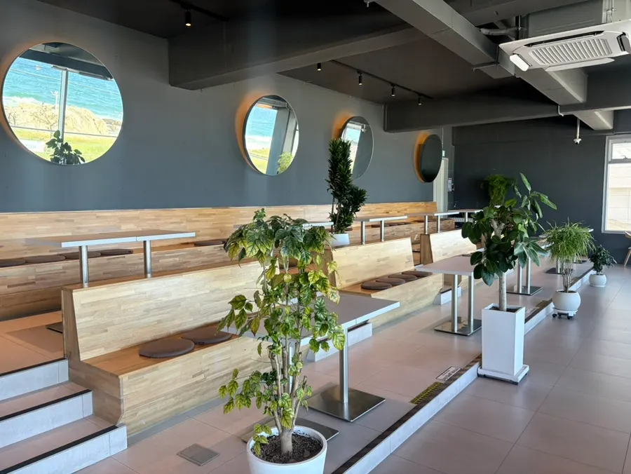View of the sea from a seat at Baegya Coffee