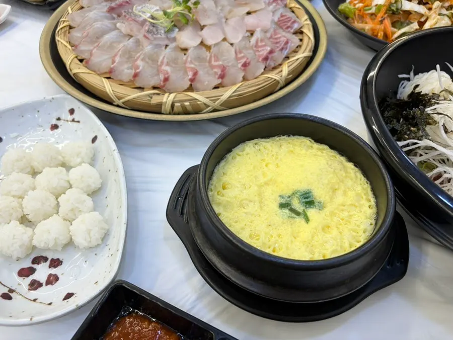 Plate of seasoned vegetables and side dishes