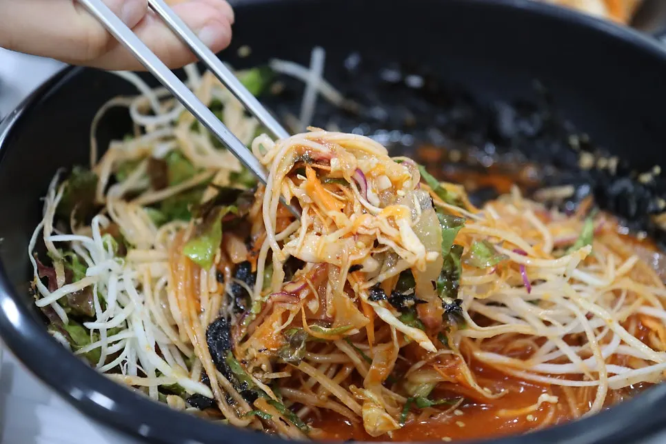 Close-up of the tangy-sweet mulhoe broth