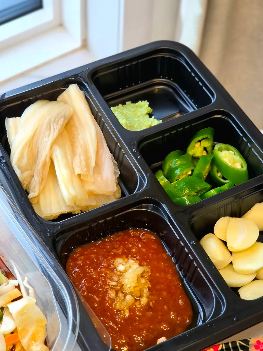 Side dishes served alongside the sashimi
