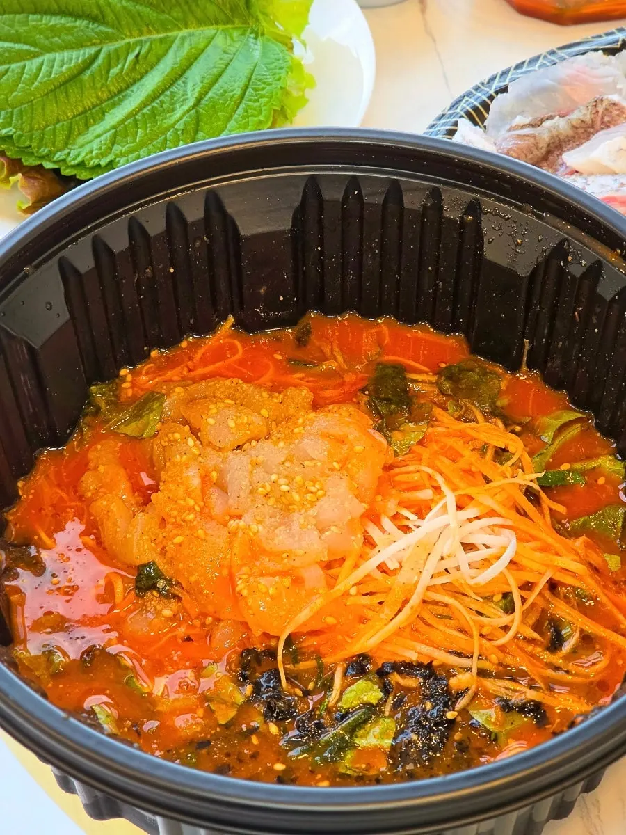 Mulhoe broth loaded with sashimi pieces