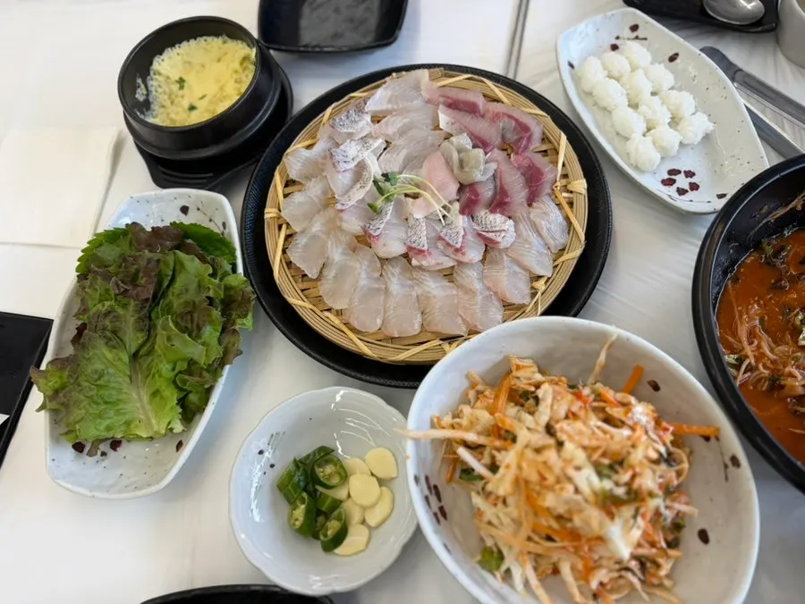 The value assorted sashimi spread on the table