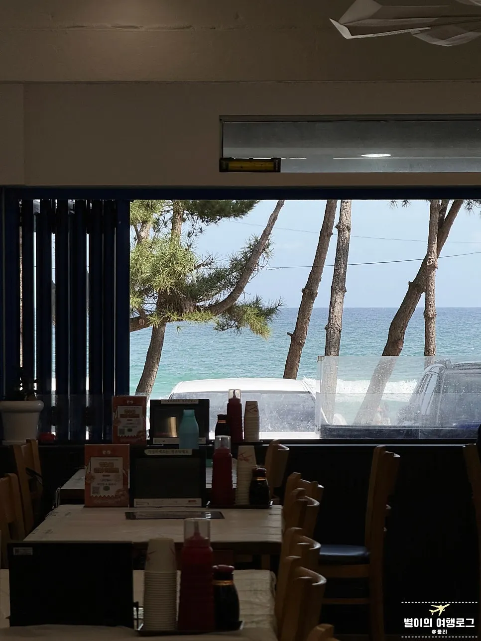 Ocean-view seating with the East Sea visible through the window
