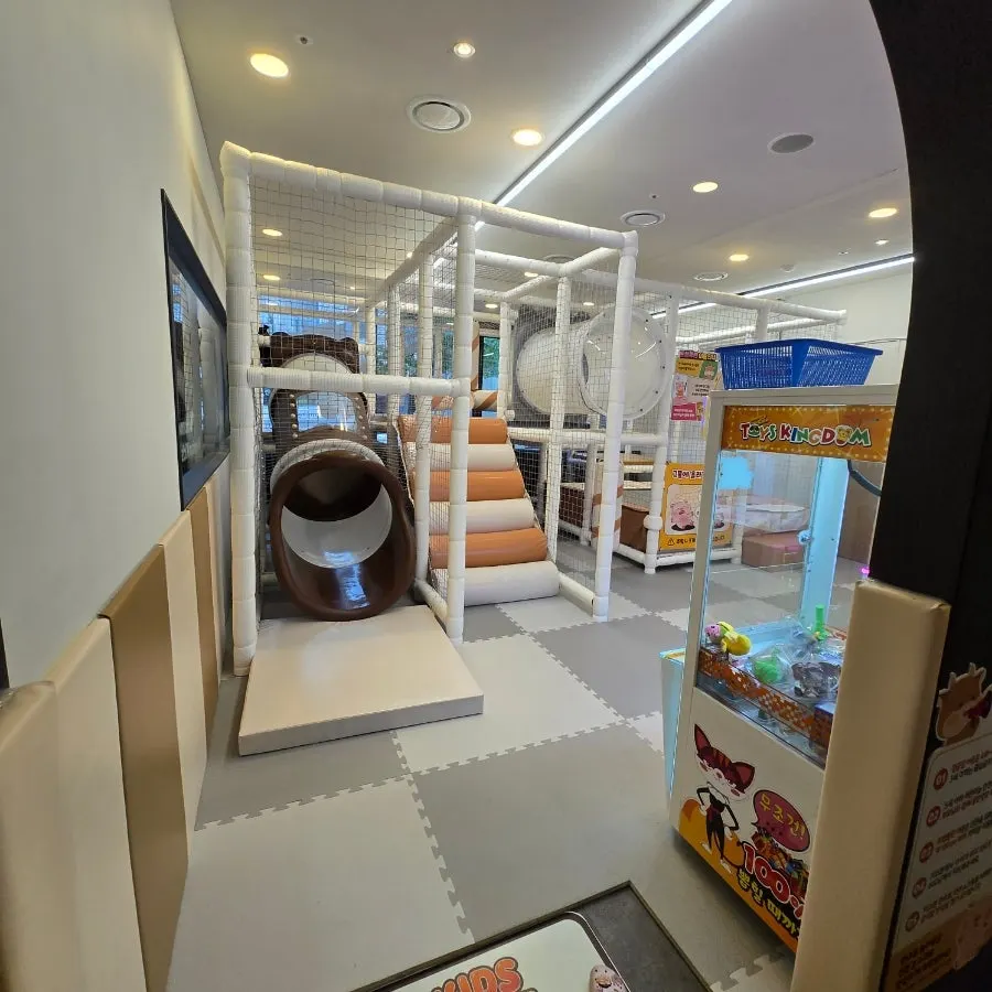 Kids' zone with a slide and play equipment