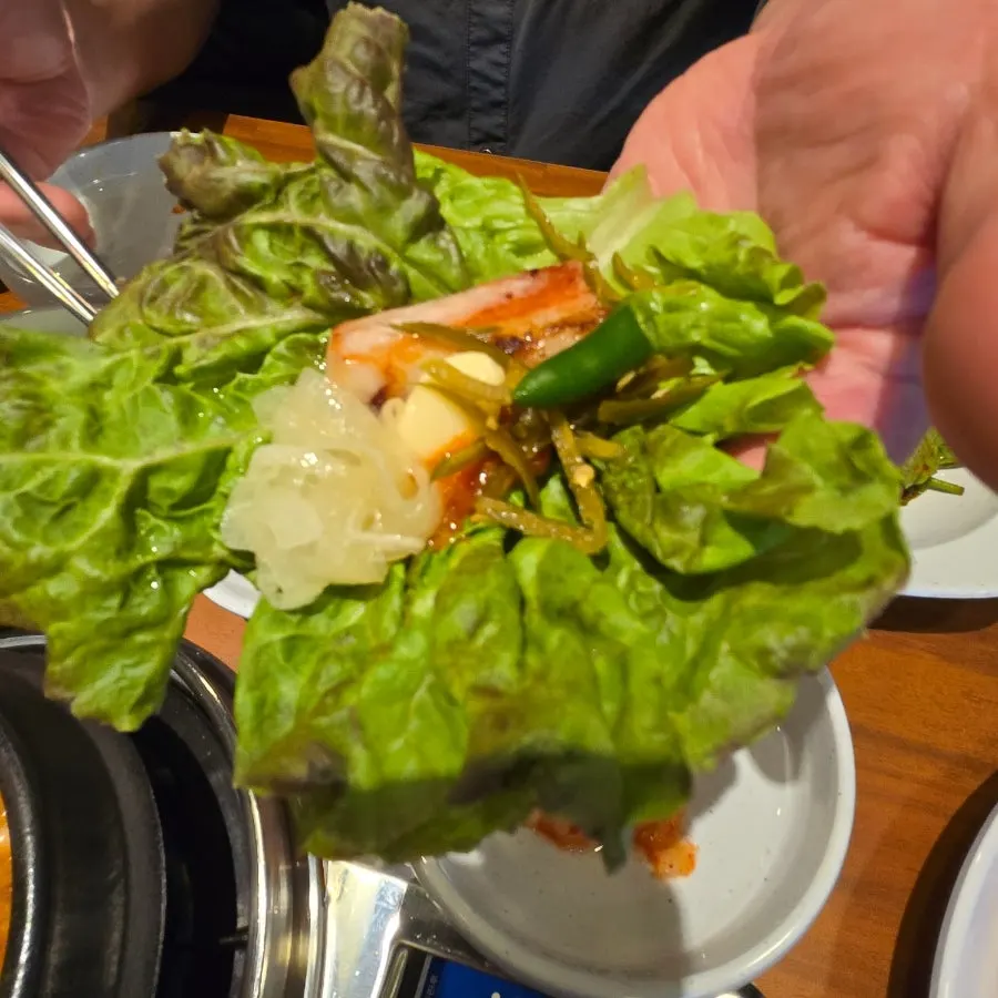 A meal of pork and side dishes