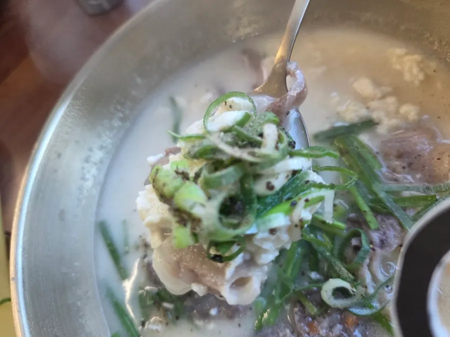 Sundae and meat added to the beef-bone sundubu