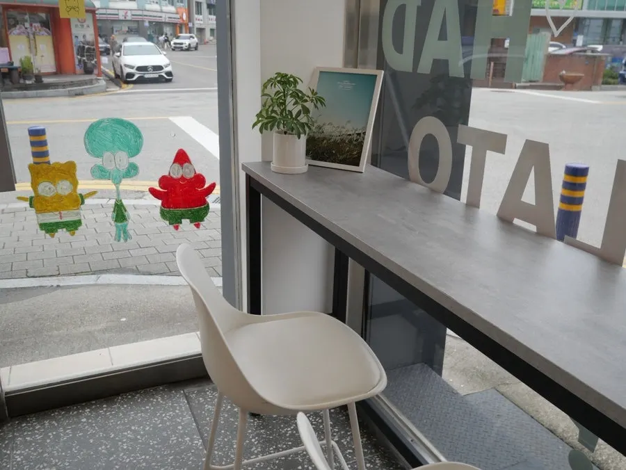 Cozy indoor seating area at Hi Gelato