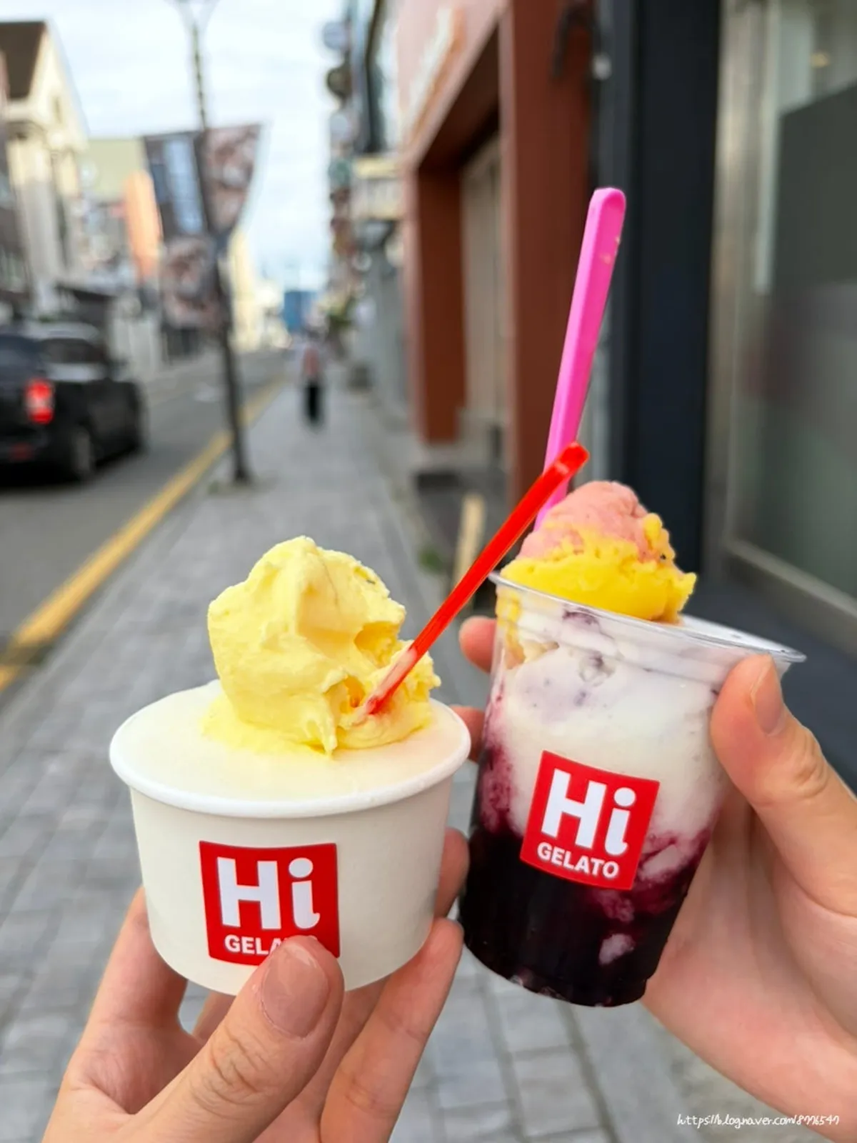 Corn gelato taste spoon on top of a cup