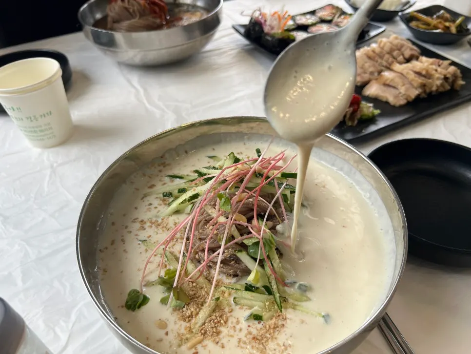 A bowl of Chodang pine nut sundubu makguksu