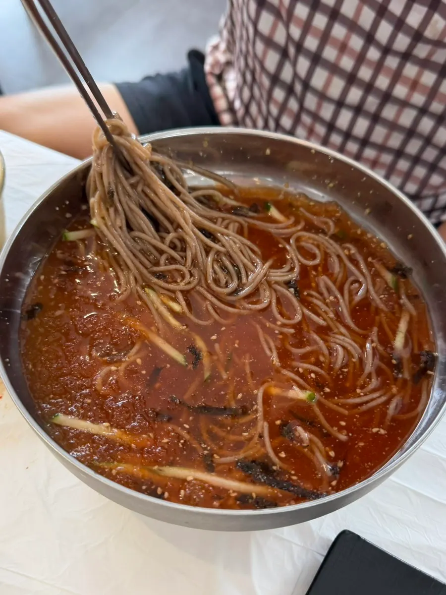 Water makguksu noodles mixed into the broth