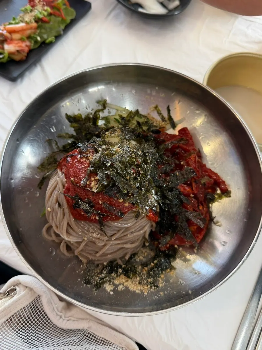 Spicy mixed makguksu with red seasoning