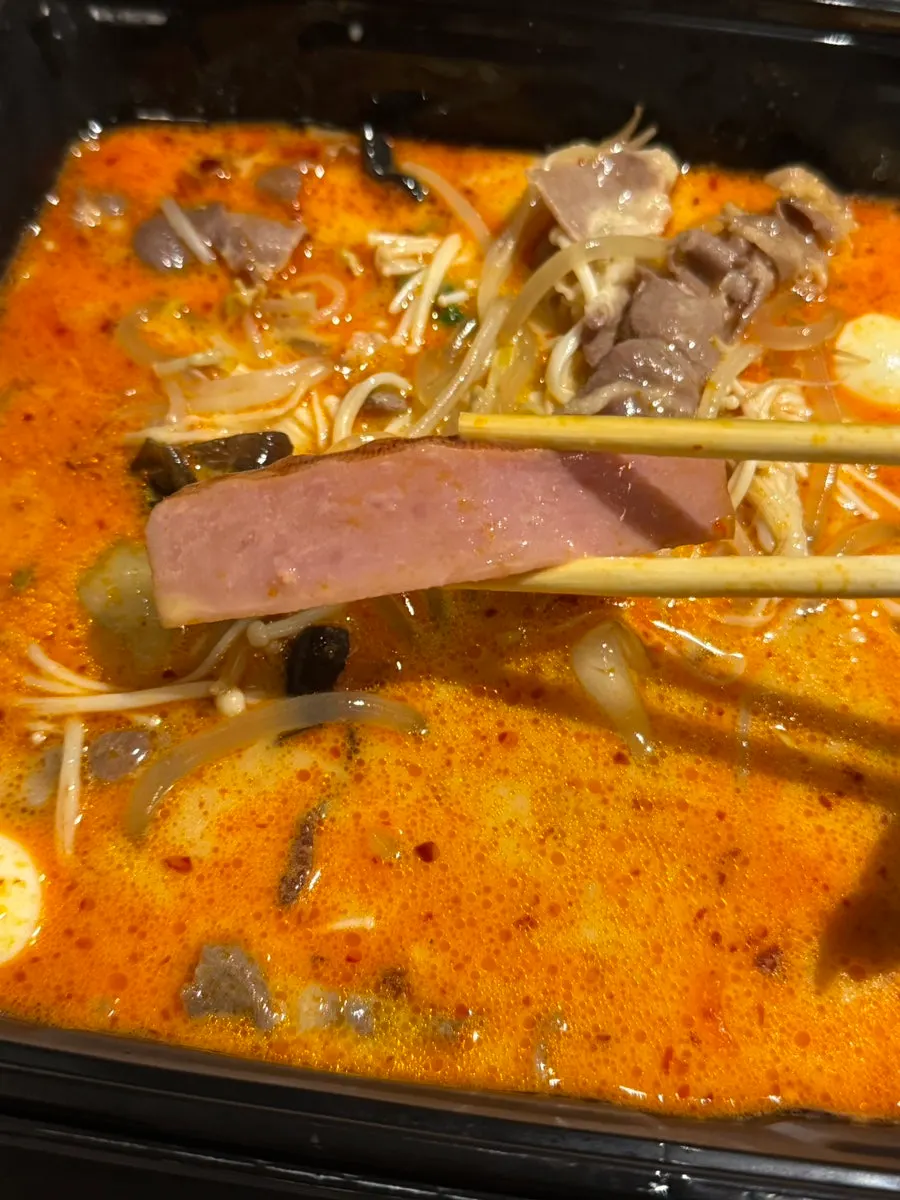 Dumpling soaked in malatang broth