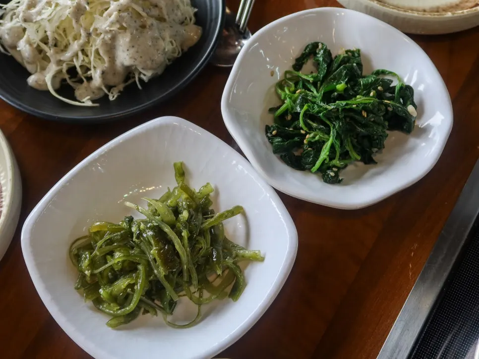 Homemade kimchi and side dishes on a plate