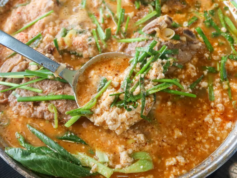 Thick, bubbling sundubu gamjatang broth