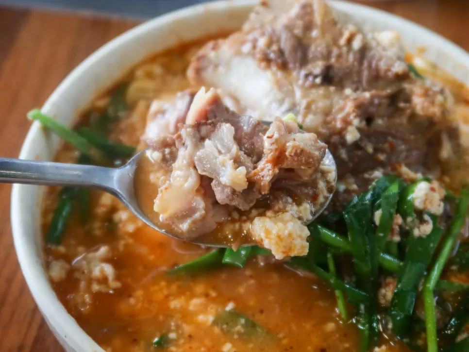 Close-up of the thick, bean curd-like gamjatang broth