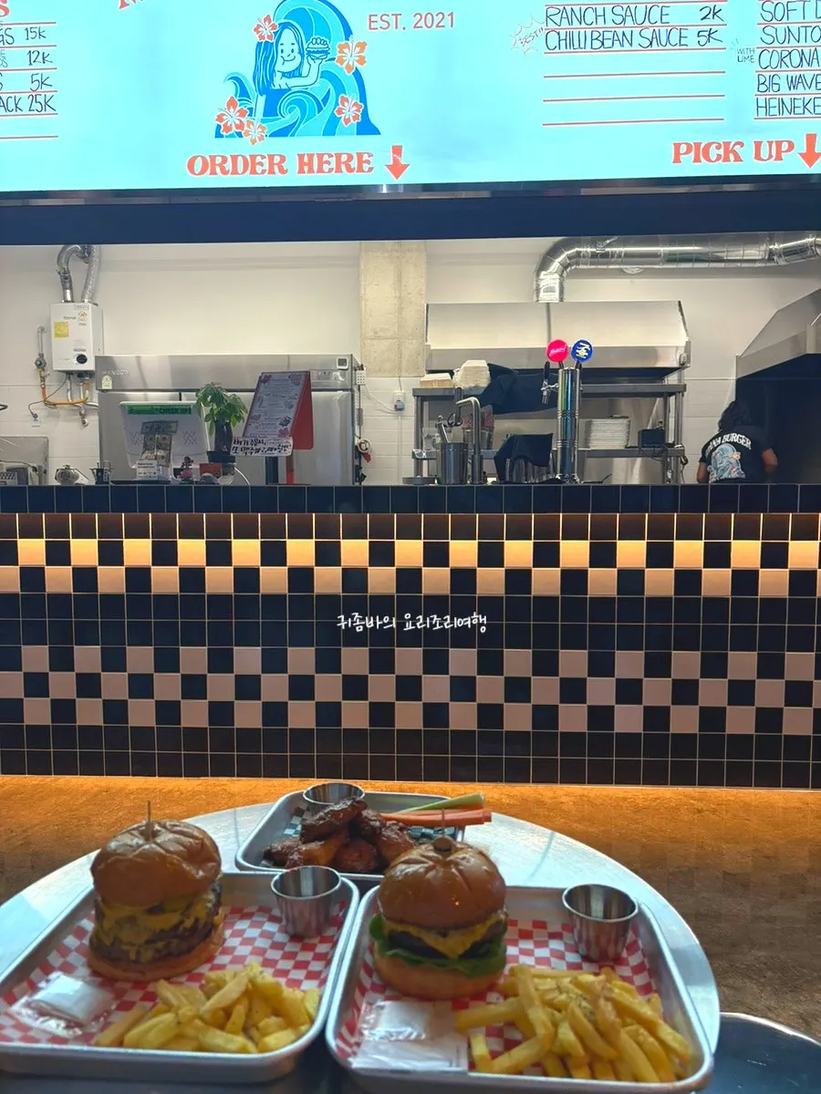 Table at Moana Burger with the ordered food served