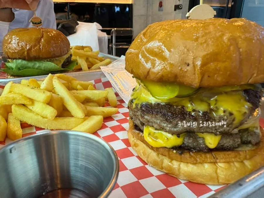 Cross-section of the double burger with only pickles and onions