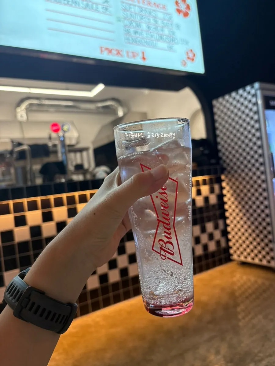 Soda served with a cup of ice