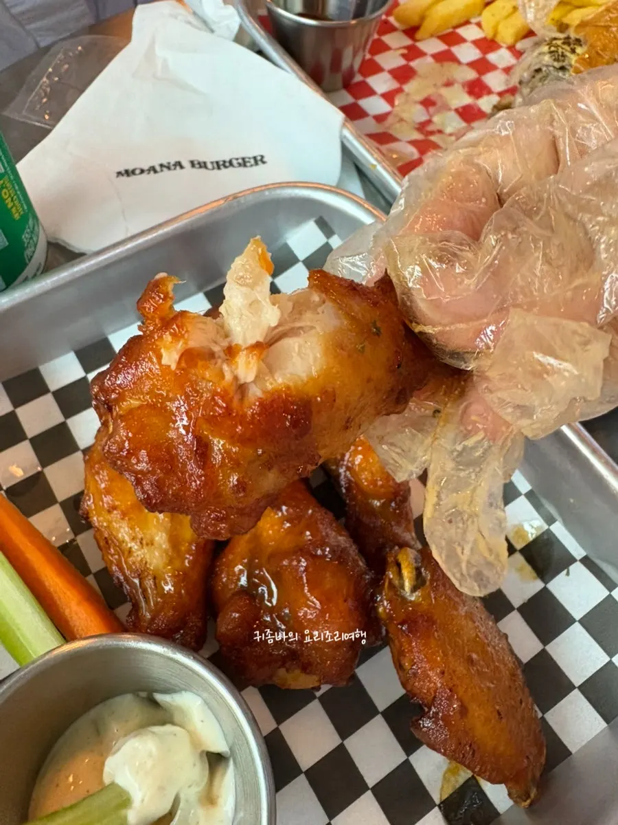 Spicy buffalo wings tossed in homemade sauce