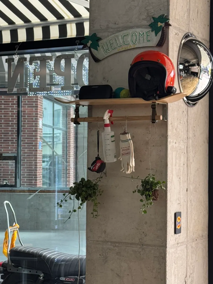 Moana Burger's interior with Hawaiian-themed props