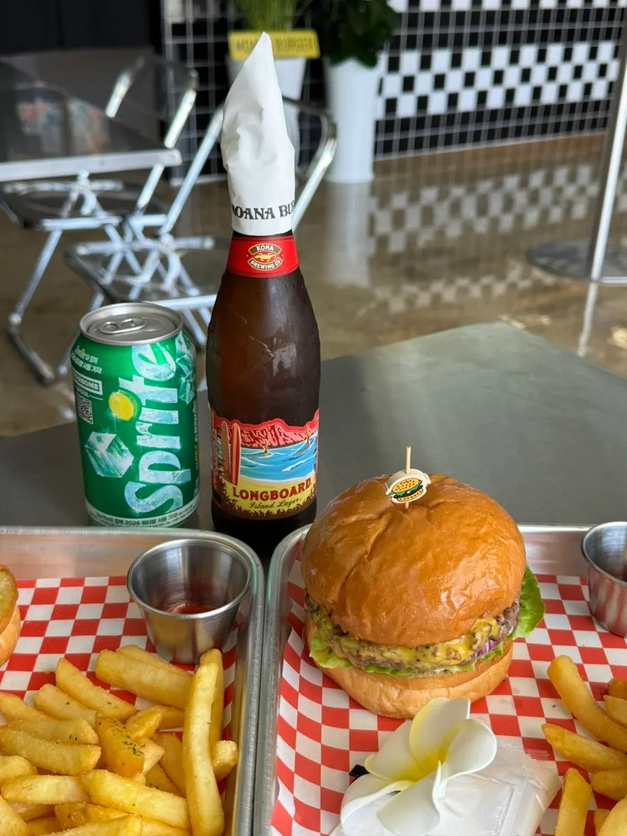 A handmade burger meal served with fries