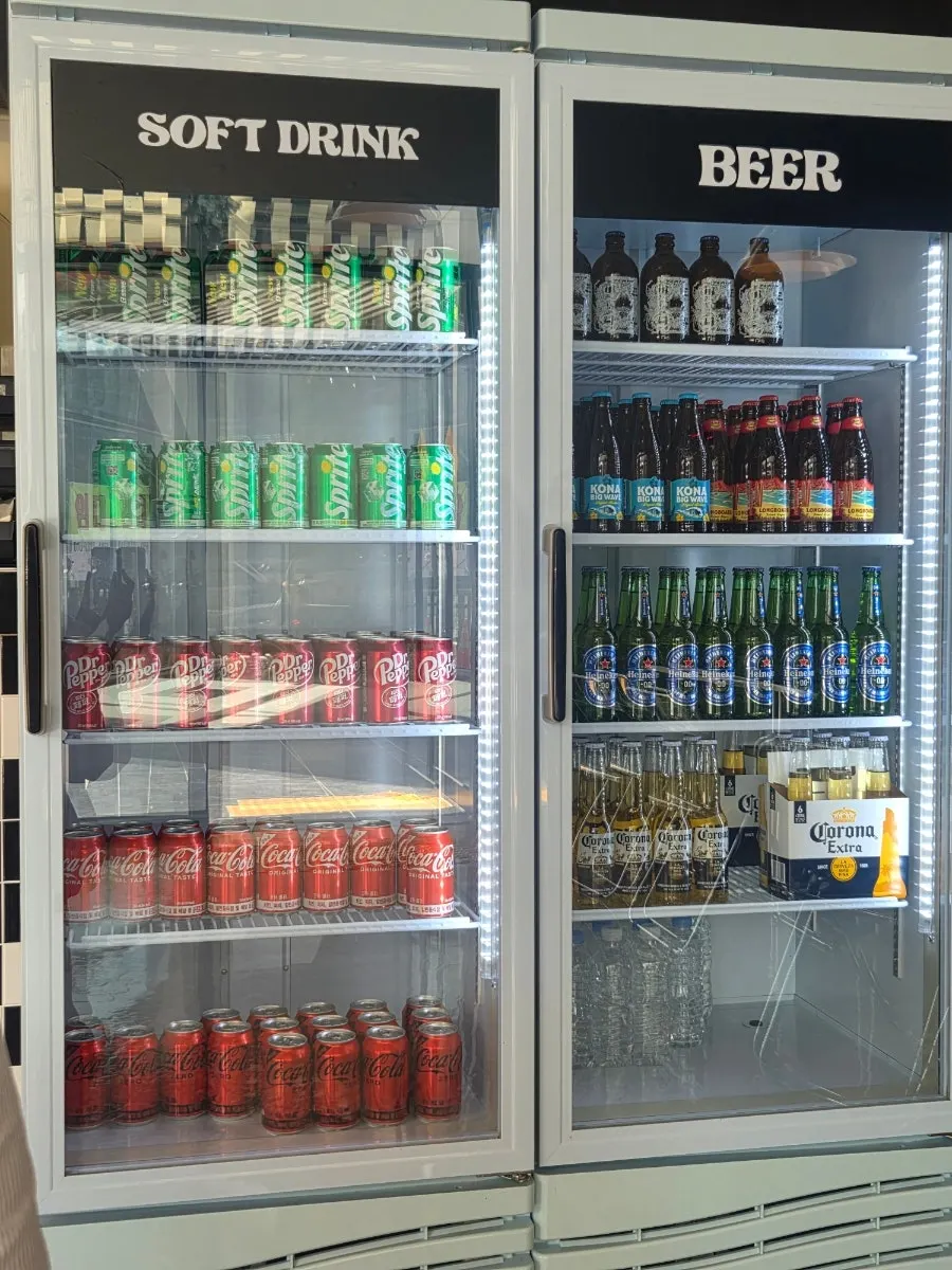 Drinks menu listing sodas and beers