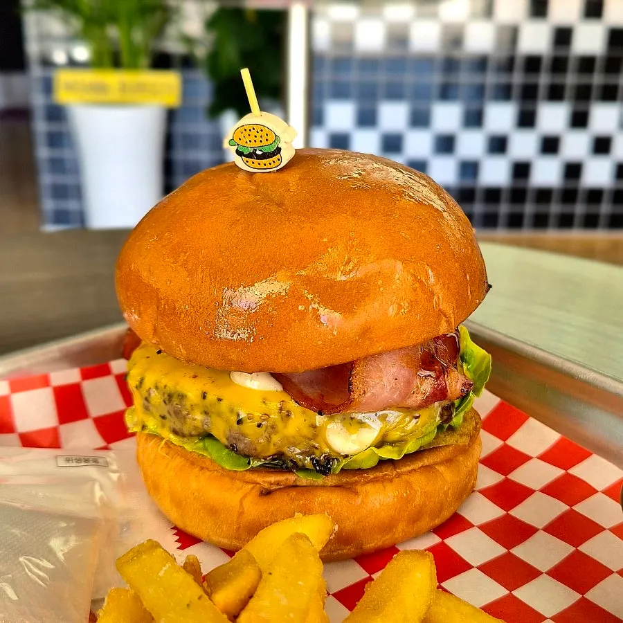 Moana Burger being cooked after ordering