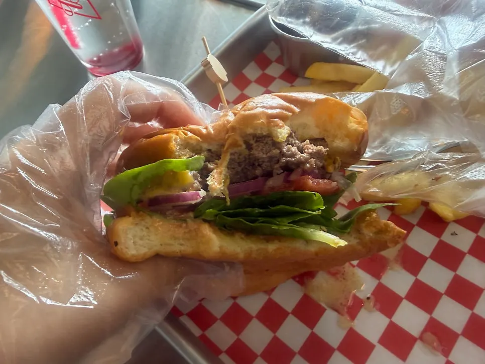 Burger and chili beans shared between two people