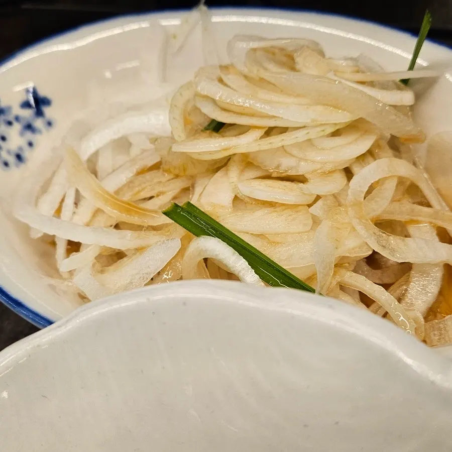 White sundubu served alongside the meat