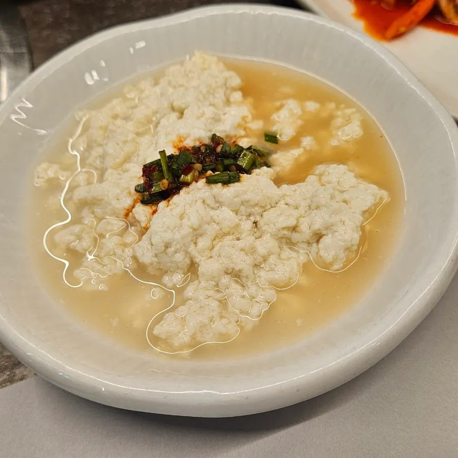 Pickled onions and pickled radish served with the meat