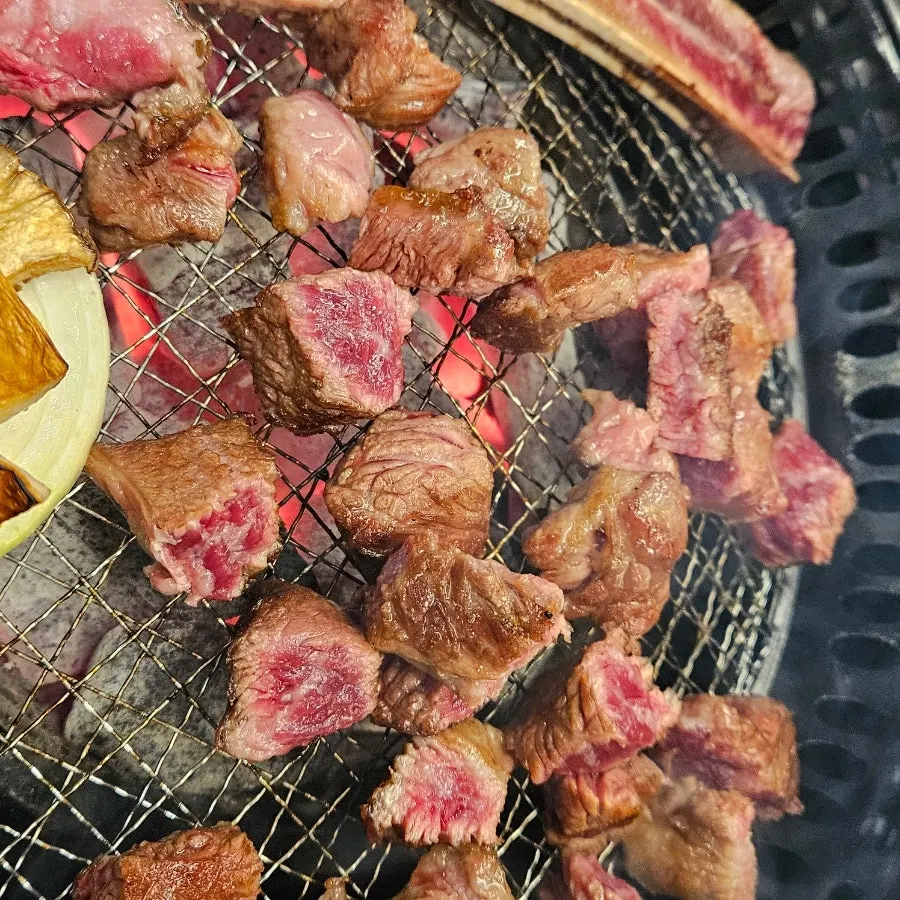 Woo-dae galbi wrapped and eaten with lettuce