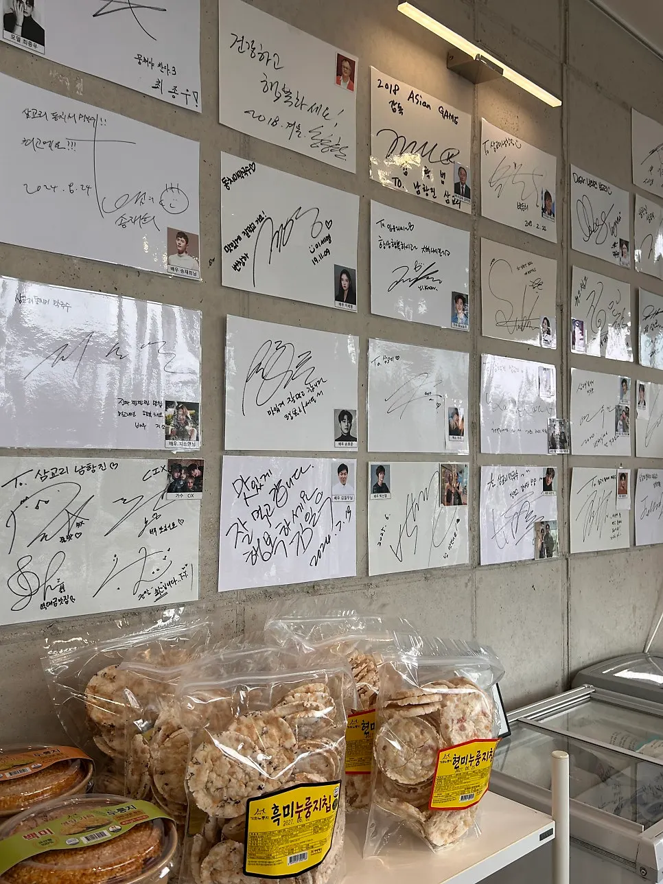 Autographs from celebrity visitors displayed in the restaurant