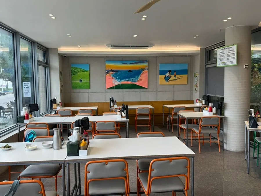 Spacious, clean interior seating at the makguksu restaurant