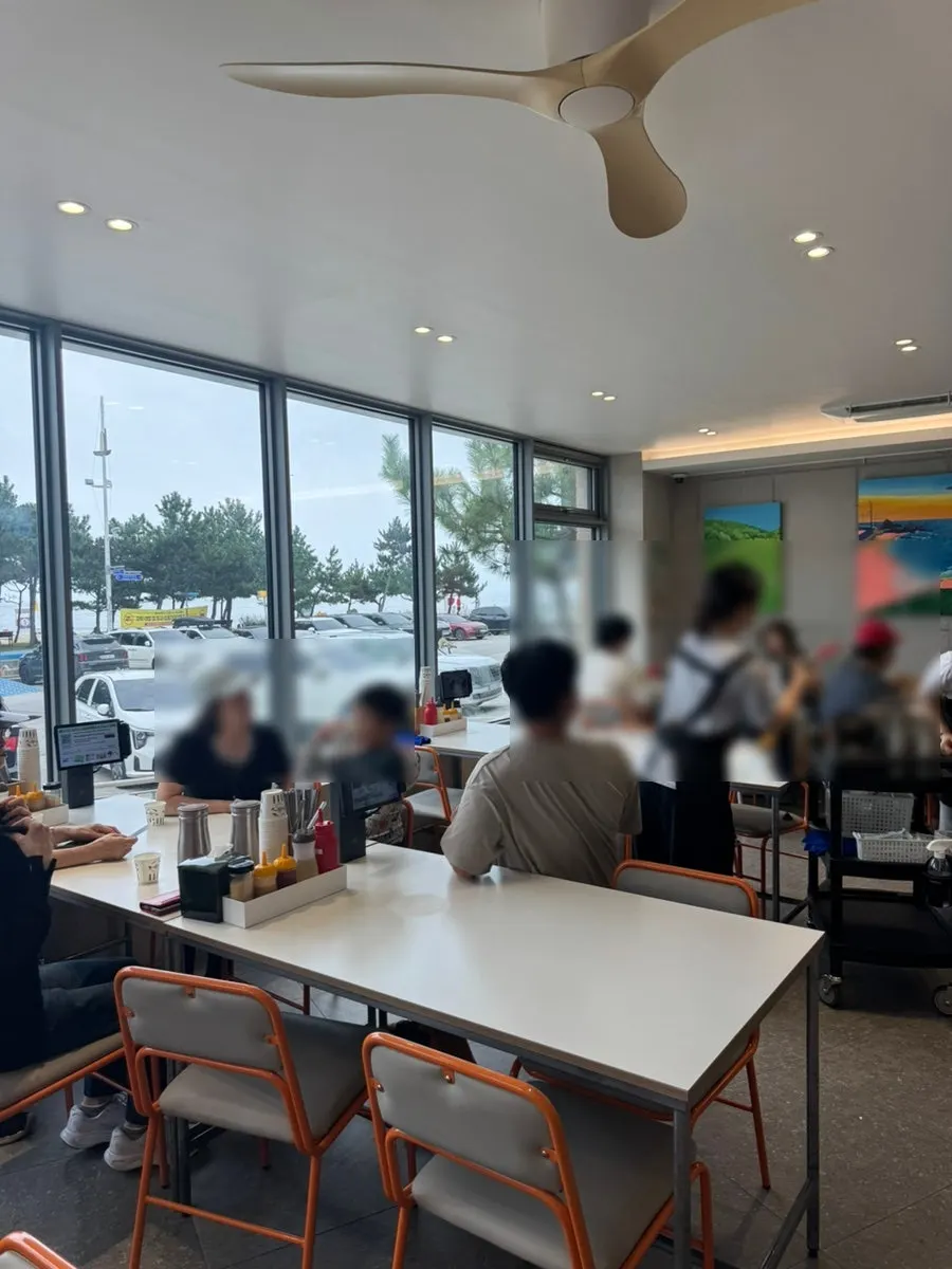 Spacious, clean interior with floor-to-ceiling windows