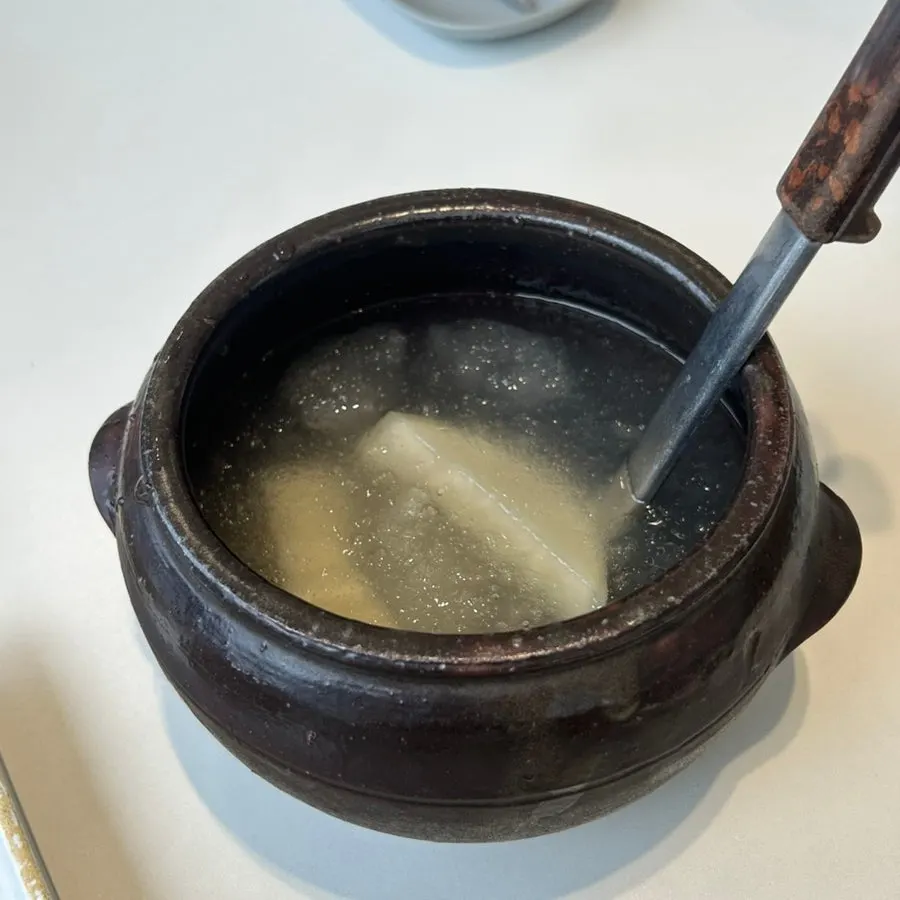 Dongchimi broth and radish used for the noodles