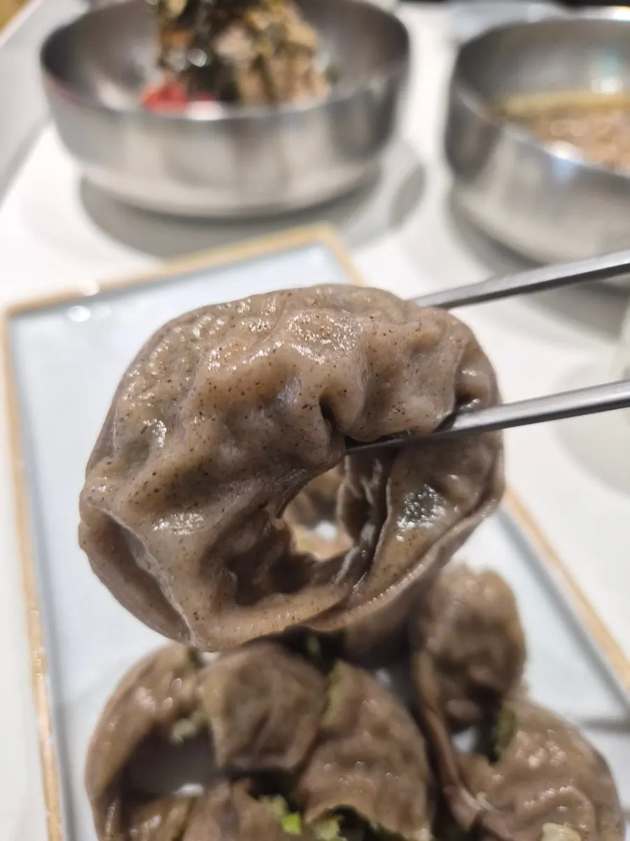 Cross-section of a buckwheat mandu packed with filling
