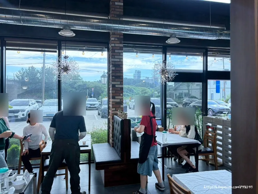 Interior tables at Saimdang Bueok restaurant