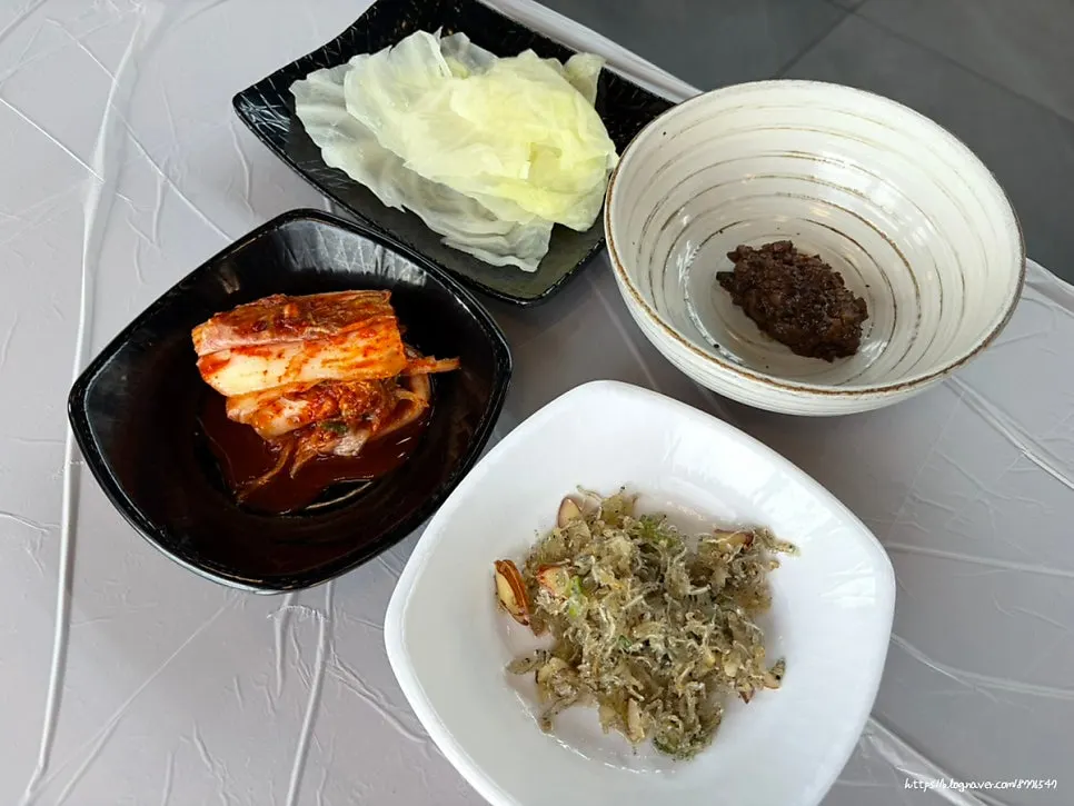 Close-up of side dish arrangement at Saimdang Bueok