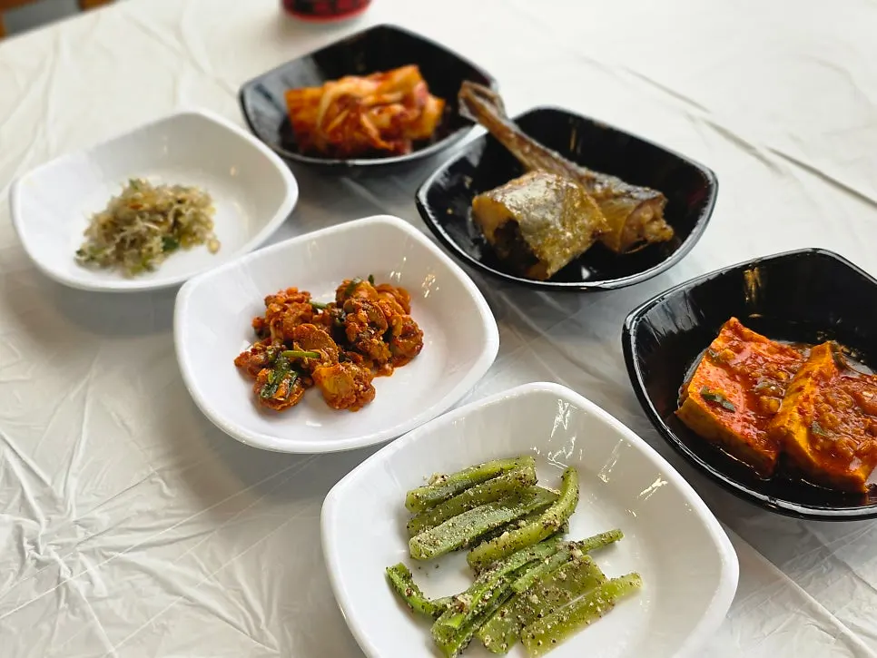 Plates of assorted banchan (side dishes)