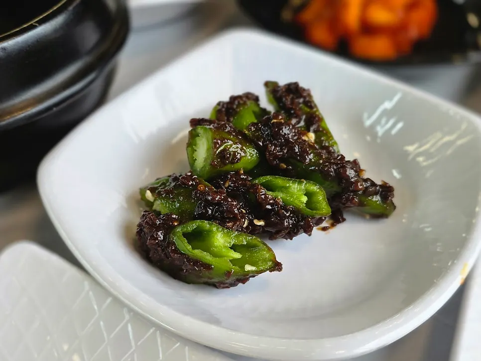Doenjang-tossed cucumber peppers, butter grilled scallops and sukhoe