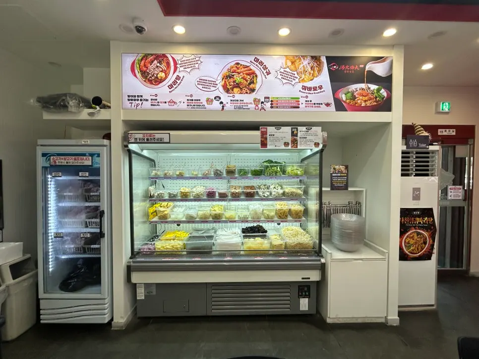 Self-bar with organized vegetables and noodles for malatang