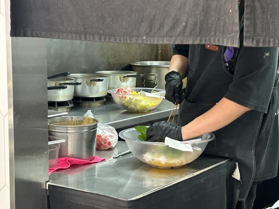 A filled bowl on the counter scale with spice level guide