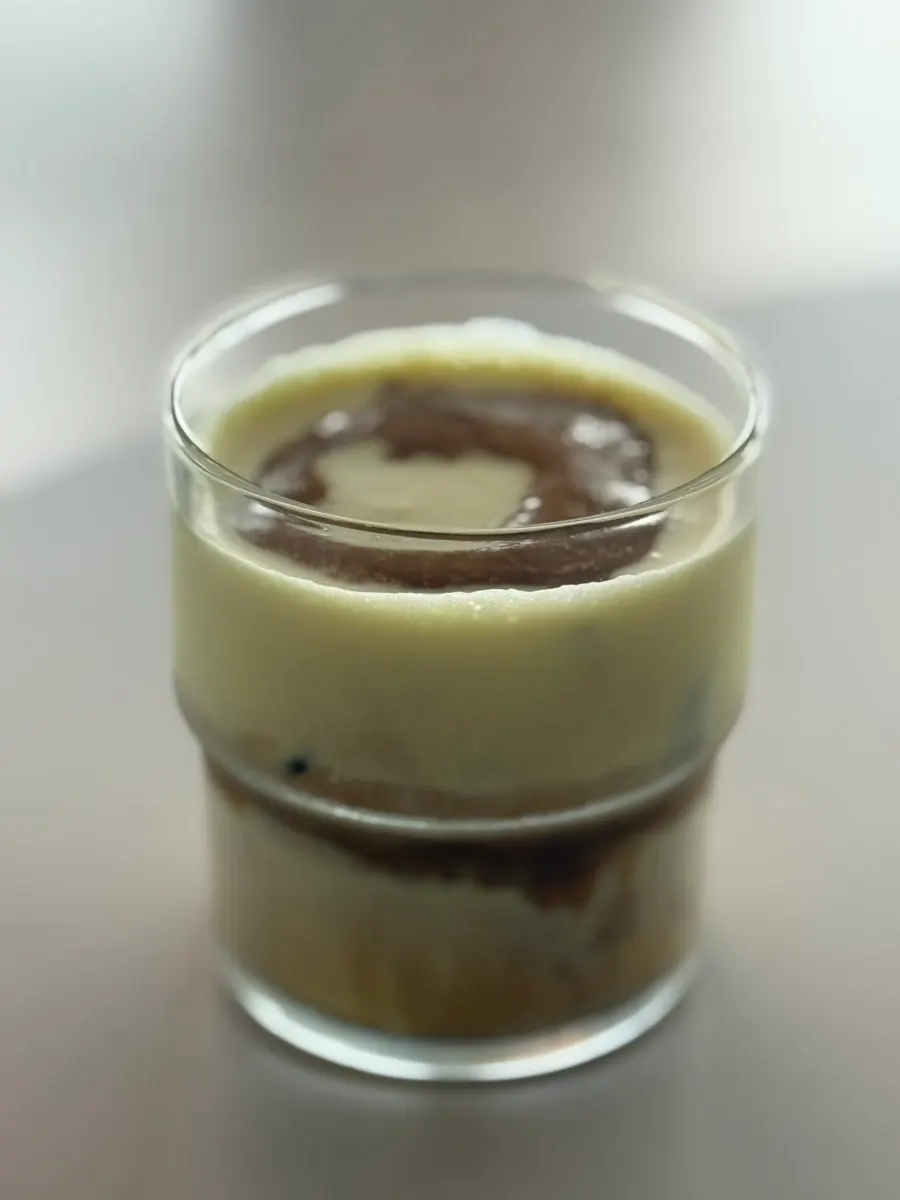 Drinks and desserts on a window-side table