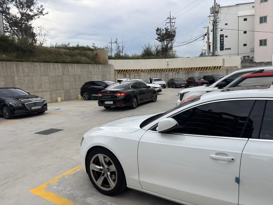 View of Baegya Coffee's building and dedicated parking lot