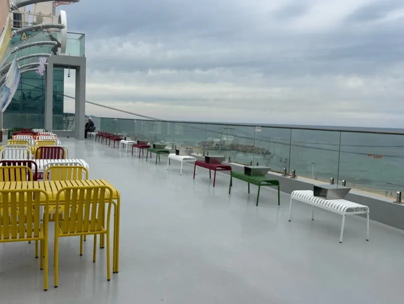 Outdoor terrace seating on one of Baegya Coffee's floors