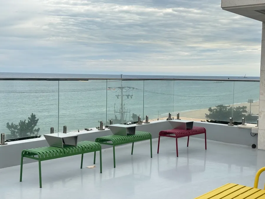 Outdoor tables on Baegya Coffee's rooftop