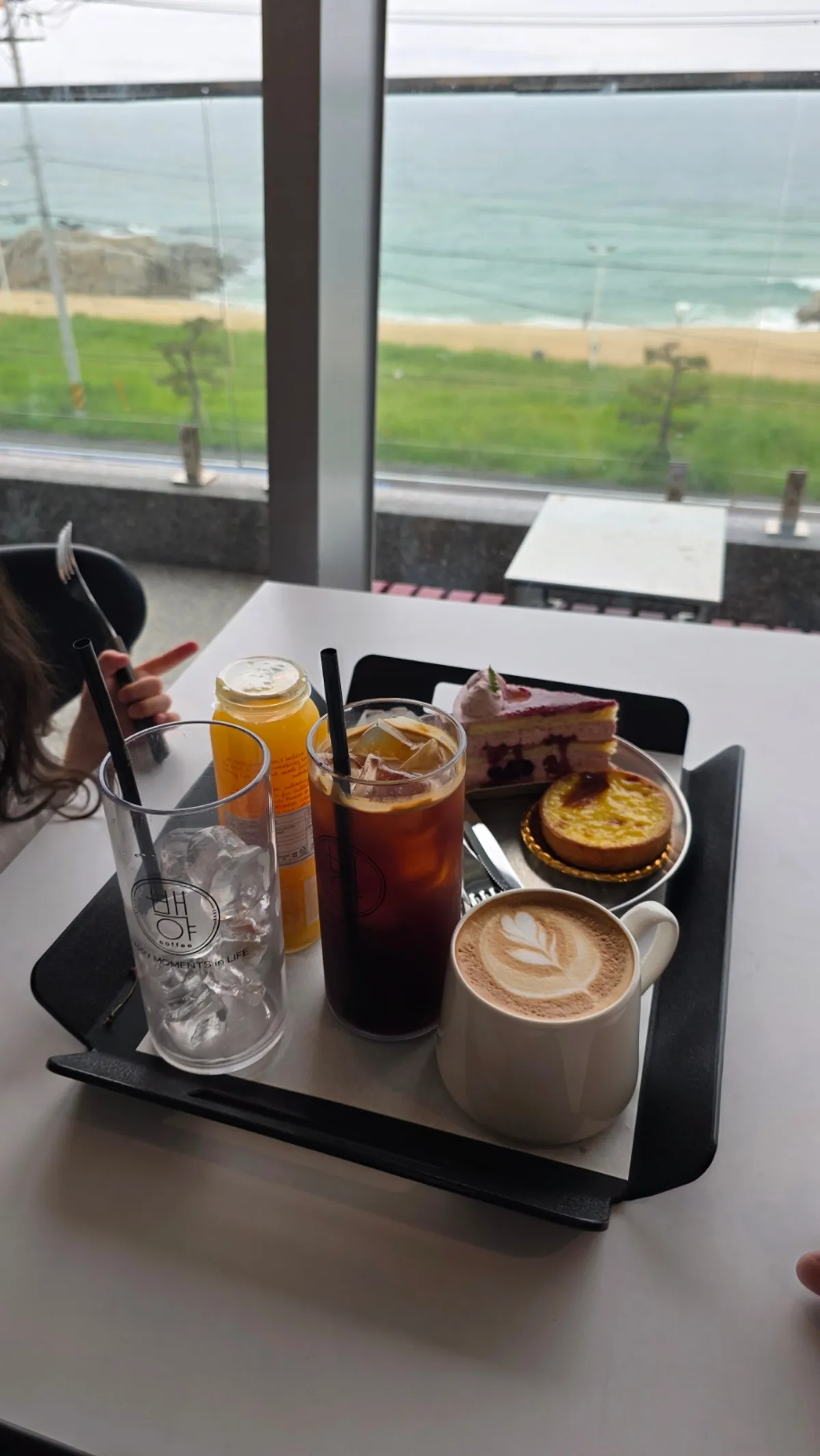 View of Baegya Coffee near Sageunjin Beach in Gangneung on a rainy day