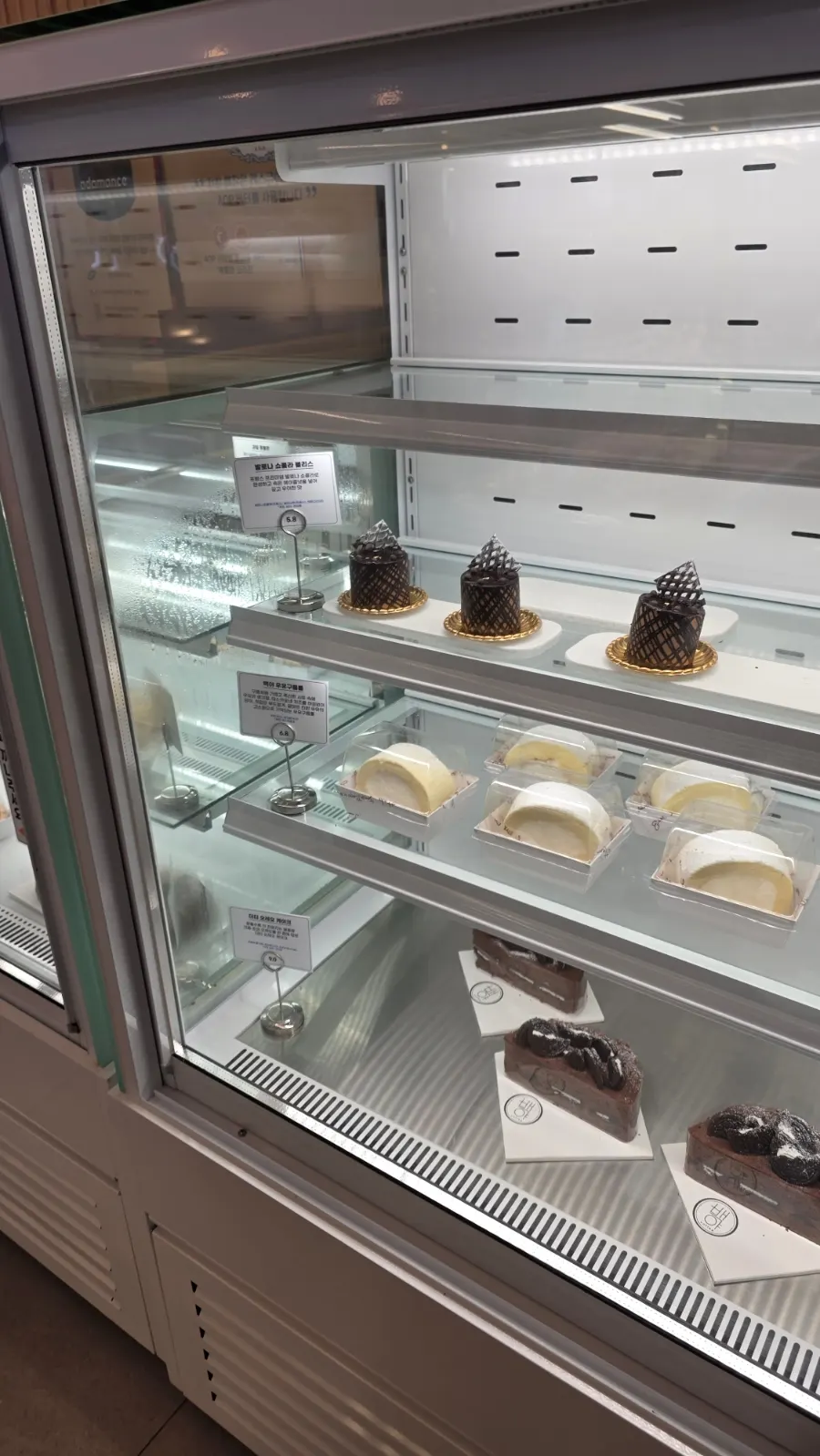Cake display case at Baegya Coffee