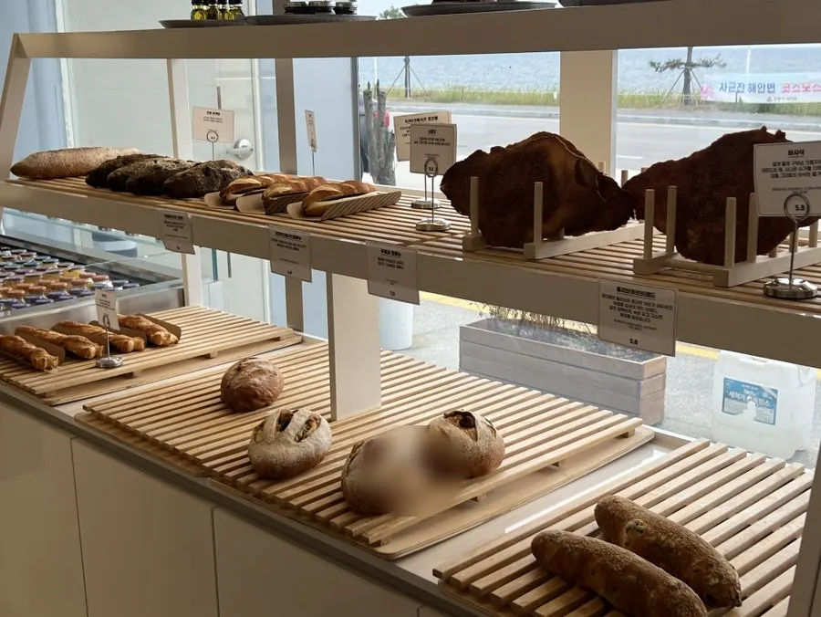 Bread trays in the Baegya Coffee bakery corner