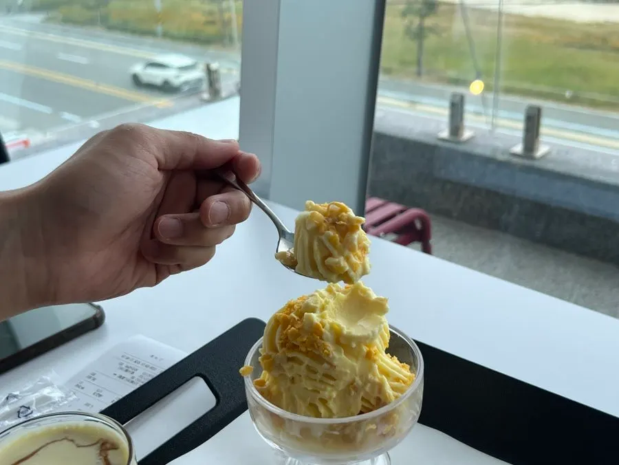 Oksigi ice cream topped with corn kernels
